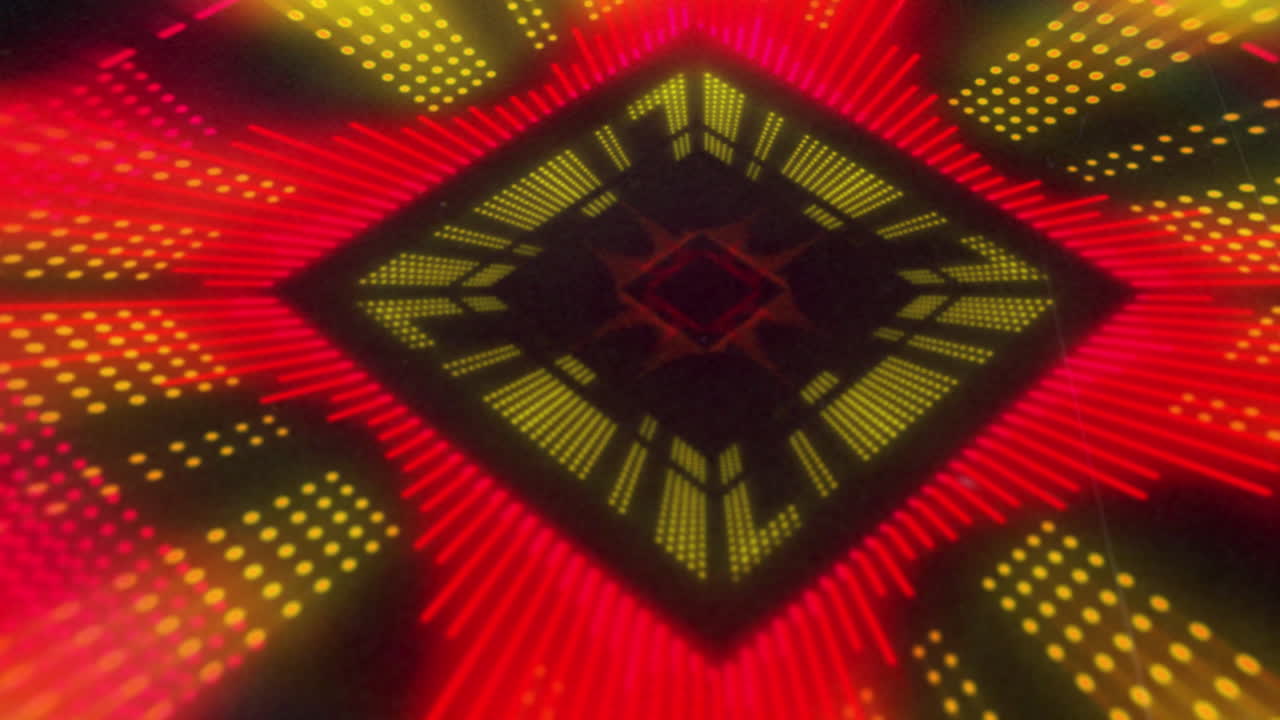 다이아몬드 모양의 노란색과 빨간색 3d 조명 디스플레이의 애니메이션이 검은색 배경에서 박이고 움직입니다.