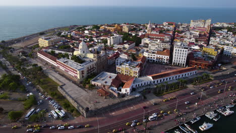 aerial view of cartagena, colombia, old colonial town buildings and traffic, drone shot