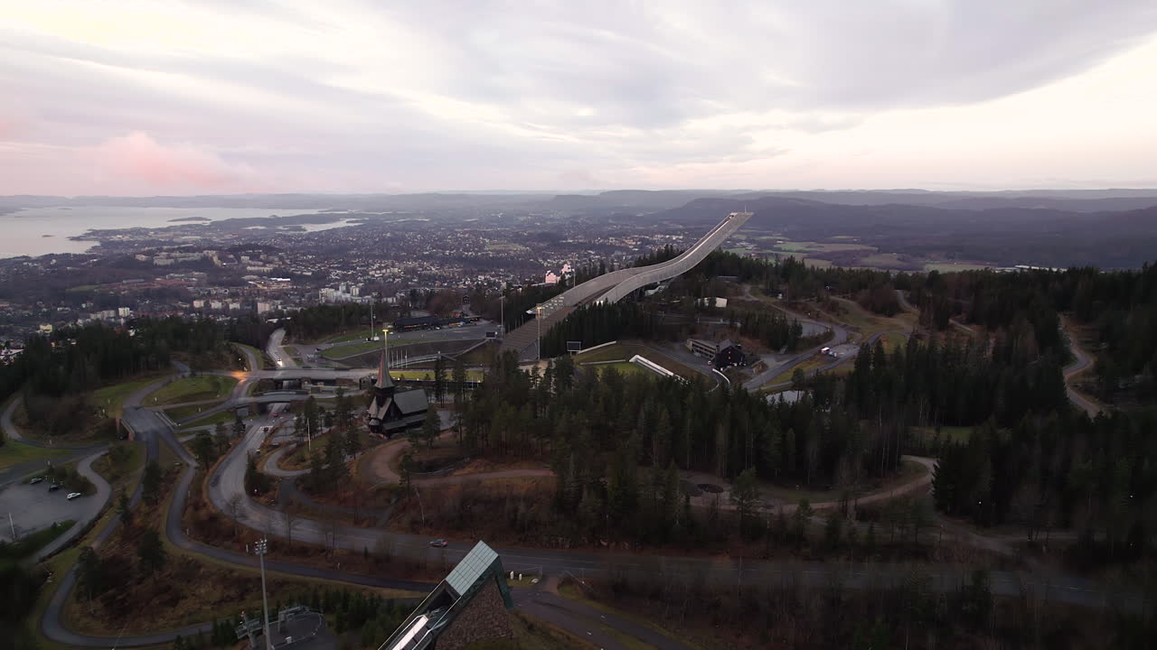Flying Over Midtstubakken And Holmenkollbakken At Holmenkollen National Arena In Oslo, Norway. Aerial Wide