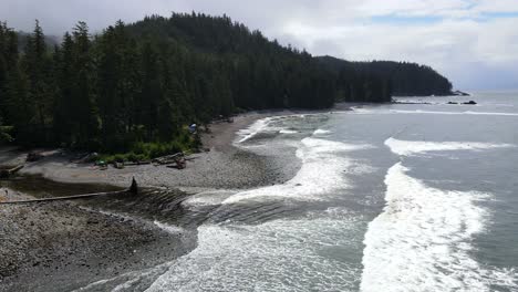 Aerial-footage-in-4k-of-Sombrio-beach-on-a-cloudy-day-during-spring-of-2021