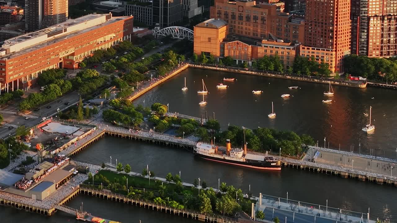 Aerial view of riverside park and boats in New York City