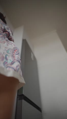 woman in a floral paisley pajama set