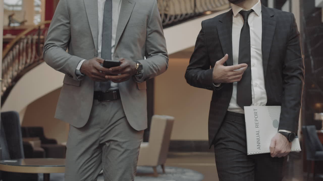 Unrecognizable Businessmen Shaking Hands Goodbye