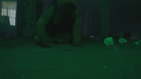 a wounded soldier in the abandoned military complex approaches anomaly
