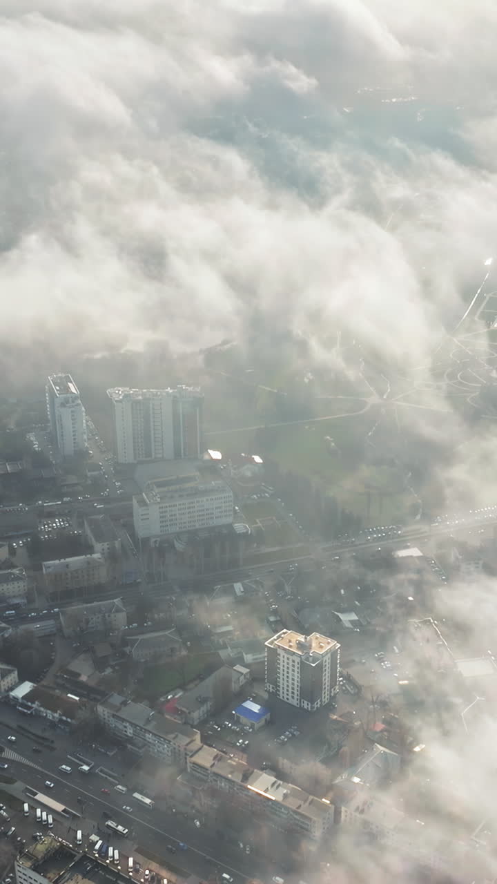 Aerial drone view of clouds over Chisinau, Moldova. Vertical