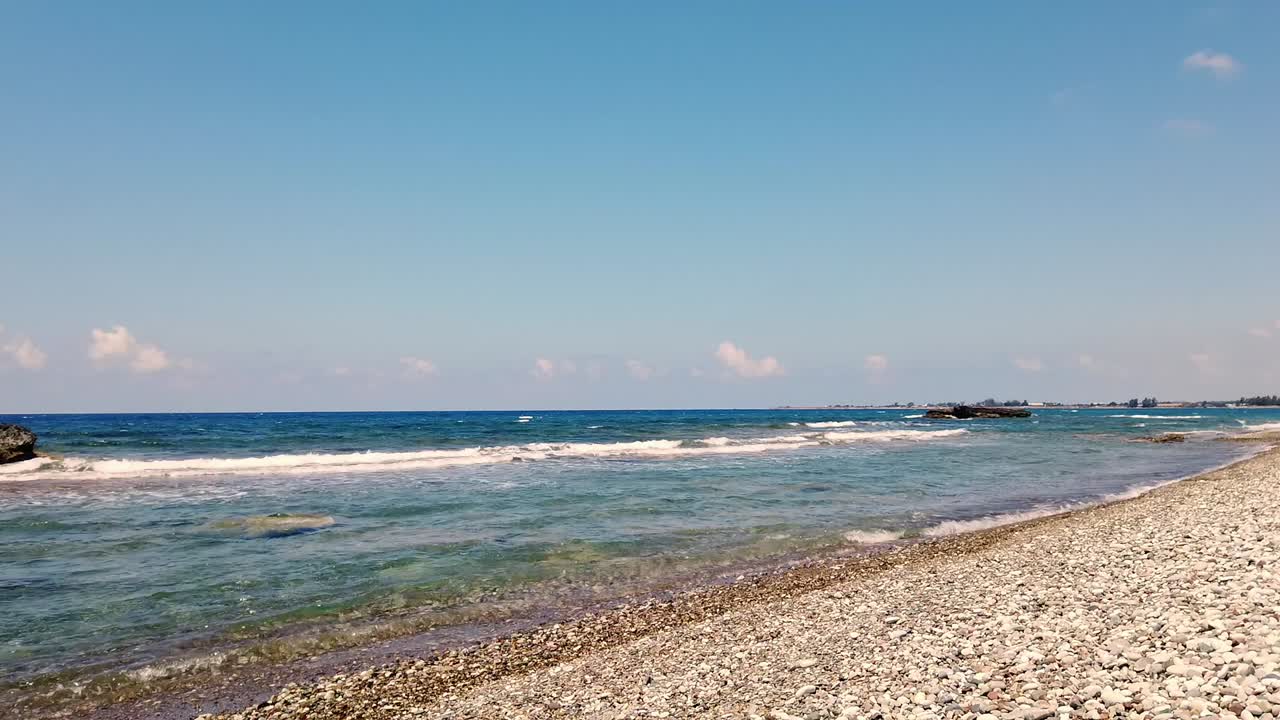 The sea and along the shore at Mandria Beach, Cyprus. A raw, beautiful moment showing nature’s rhythm—ideal for coastal, travel, or relaxation themes.