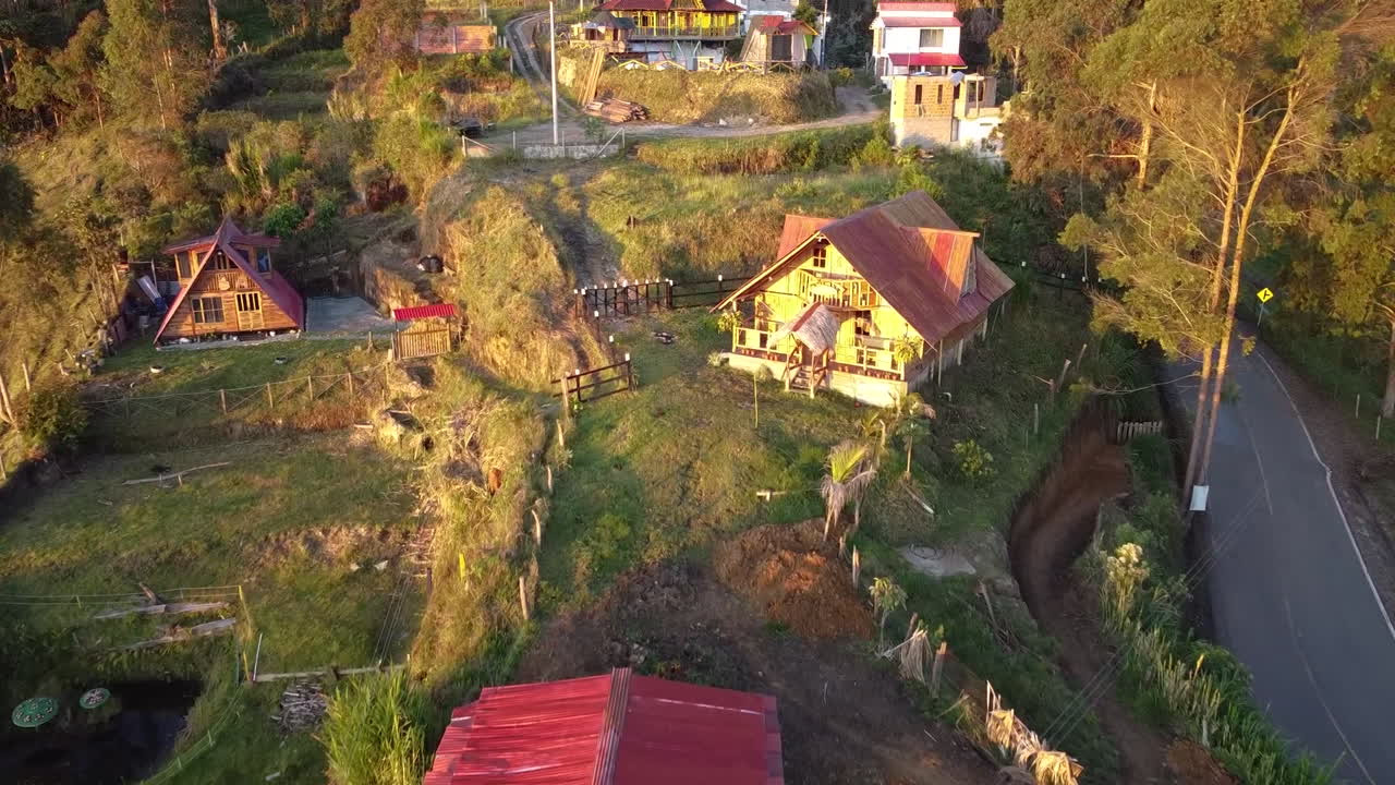 Rural Houses on a Hillside at Golden Hour