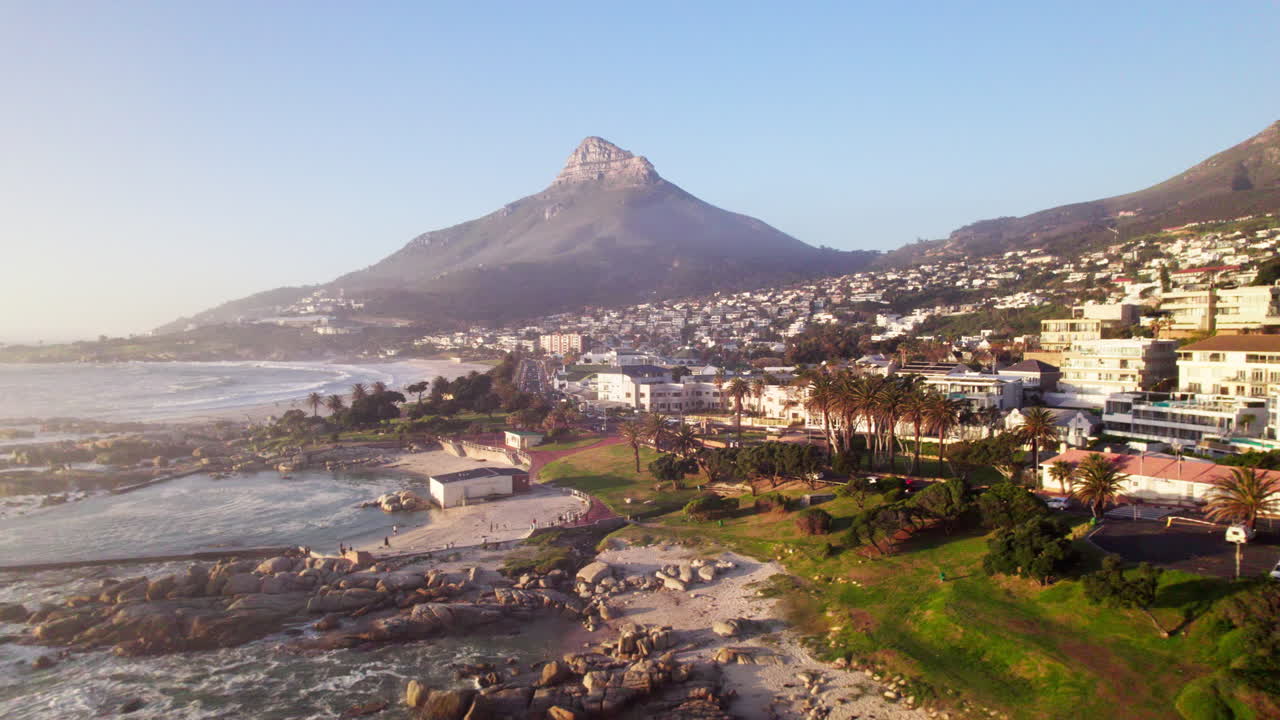 Cape town coastline and lion's head mountain at sunset, aerial view