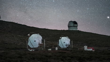stunning view of the roque de los muchachos observatories under a starry sky, timelapse