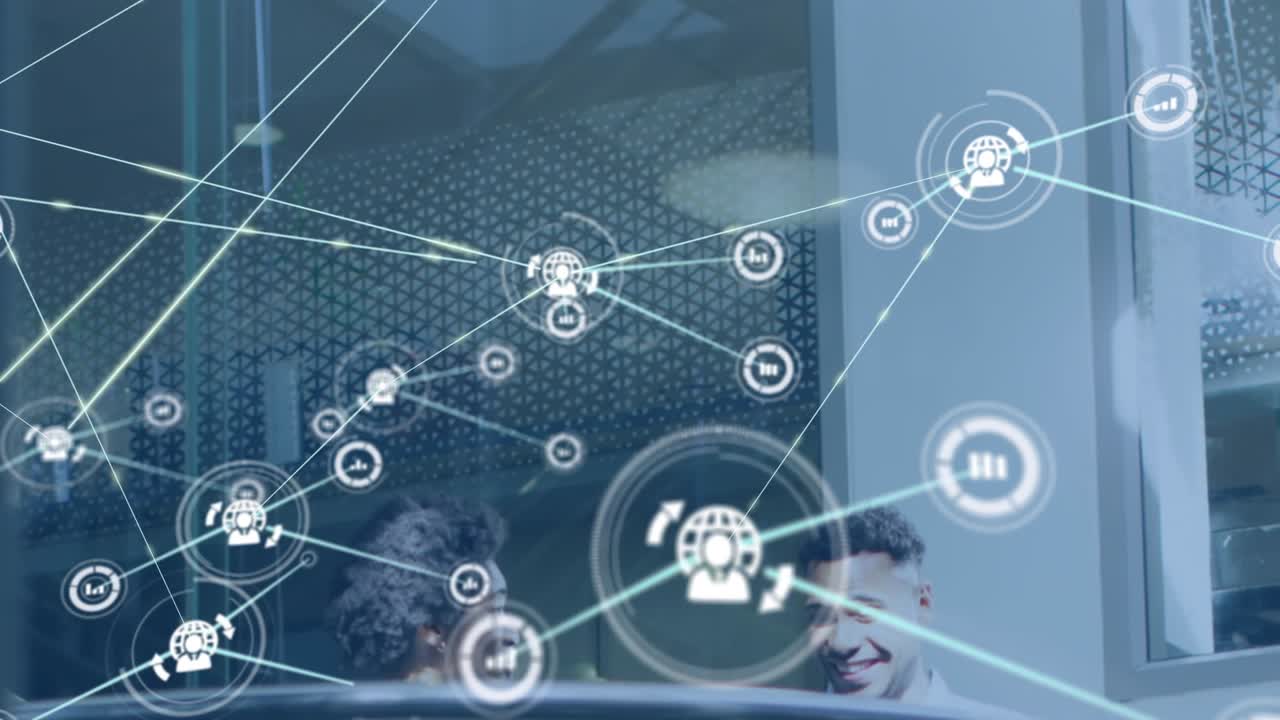 Animation of network of digital icons over diverse man and woman discussing on stairs at office