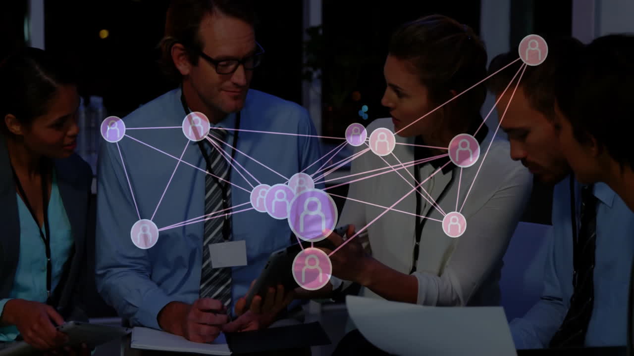 Discussing animation overlay, business professionals networking in meeting room