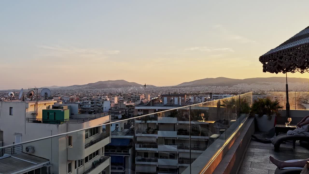 Cityscape Sunset View from Rooftop Terrace