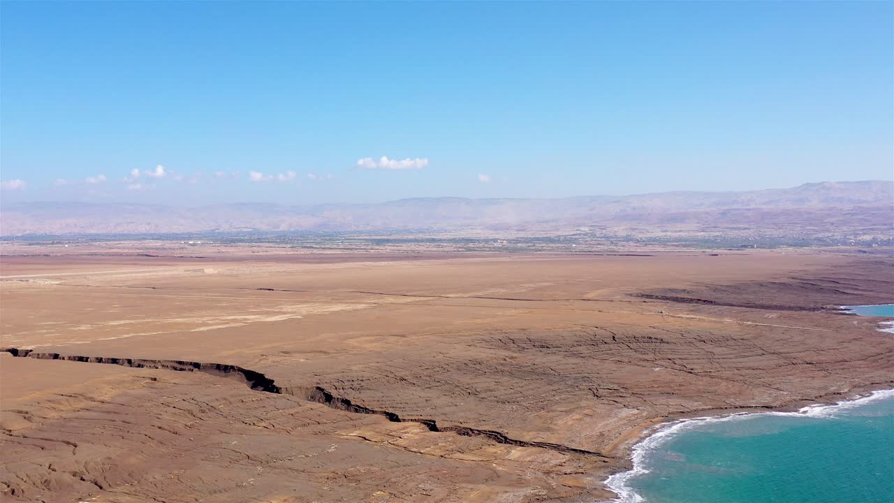Panoramic Aerial View of the Dead Sea Landscape with Sinkholes and Arid Desert