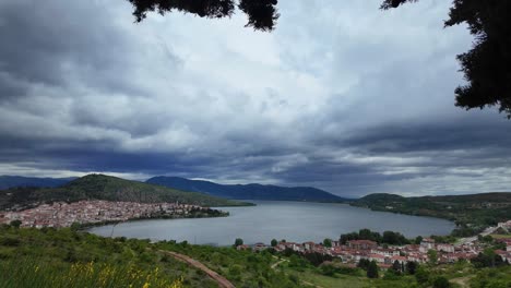 Nature-lake-and-mountain-city-in-north-of-Greece,-elevated-panoramic-view