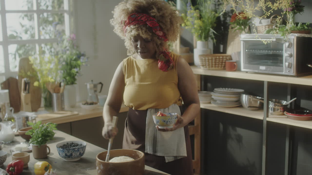 Female Food Blogger Oiling Dough and Speaking on Camera