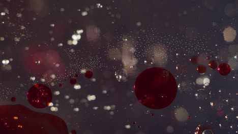 abstract blood red and clear liquid bubbles and orbs motion bokeh texture background