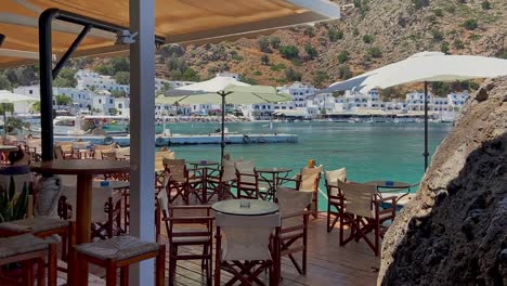 Calm-relaxing-surrounding-at-the-cafe-in-Loutro,-Crete