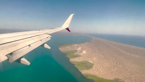 shot from airplane window during landing in los cabos mexico