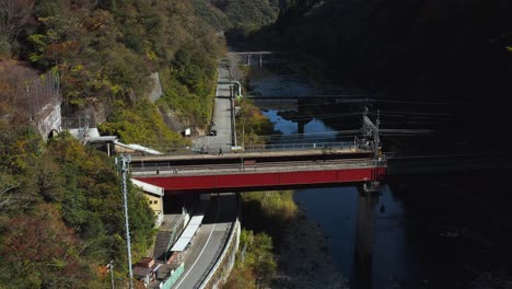 Aerial-view-of-Takedao-Station-in-the-mountains-of-Japan-in-Autumn