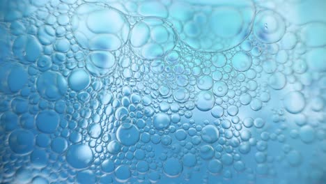 gotas de aceite abstractas en agua de colores