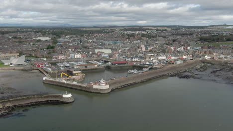 an aerial view of arbroath harbour and town on a cloudy day