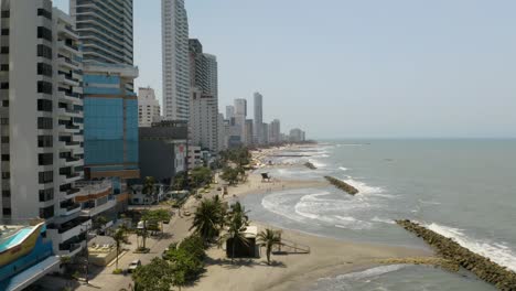 Low-Aerial-Pullback-Above-Cartagena-Beaches-in-Bocagrande