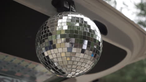 disco ball in a car trunk