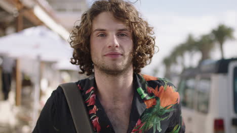 portrait of young attractive man smiling confident enjoying sunny vacation