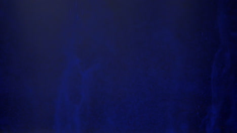 murk bubbles rise in the dark water. the abstract underwater ocean landscape is filled with swirling particles and smoke like rising bubble shafts.