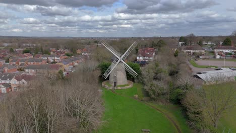 an aerial view of bradwell windmill in milton keynes on a cloudy day, buckinghamshire, england, uk