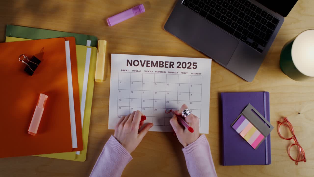 Person Marking Date on November 2025 Calendar