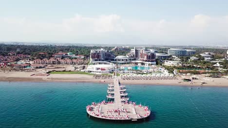 luxury resort with pier and beach