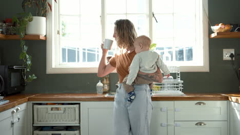 mother and baby in kitchen