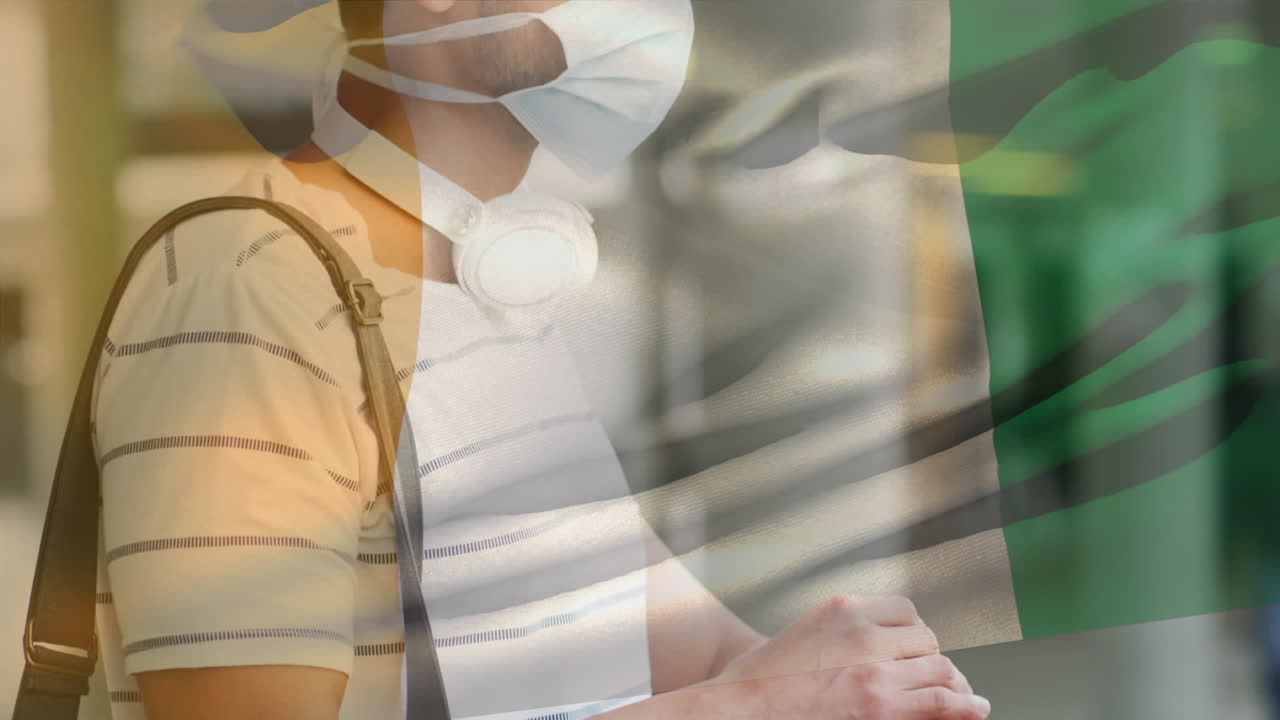 코로나19 전염병 기간 동안 마스크를 쓰고 있는 남자 위에 날아다니는 아이보리 코스트의  ⁇ 발의 애니메이션