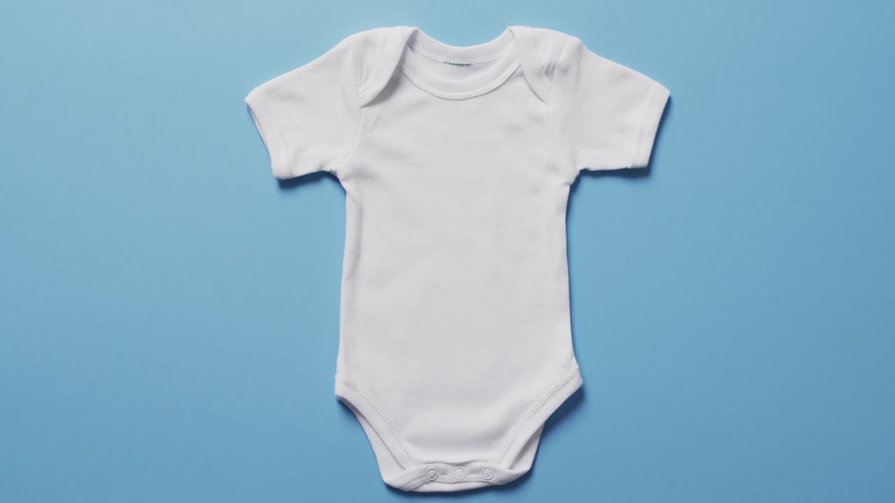 Video of whit baby grow with copy space on blue background