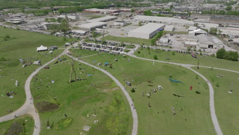 aerial footage of a kite festival in the sculpture fields in chattanooga, tn