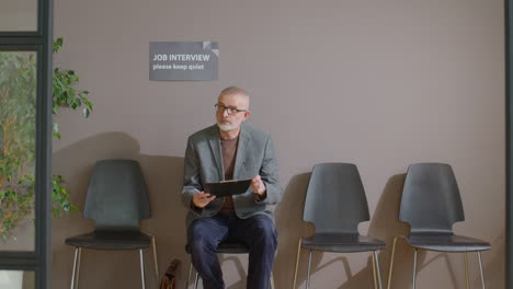 senior man waiting for job interview