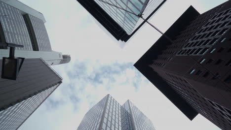 view upwards to skyscraper and cables in the middle of an intersection