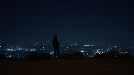 depressed person on a high cliff