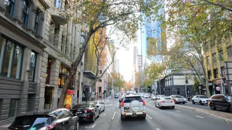 cars navigating busy urban streets in melbourne