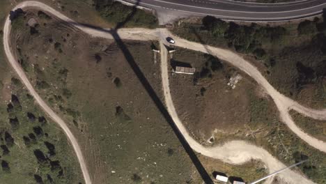 aerial view of wind farm in mountainous terrain