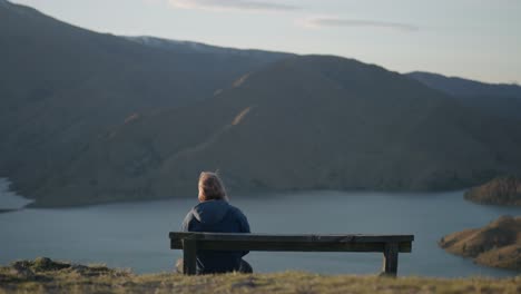 Hand-held-shot-of-a-hiker-resting-on-the-Benmore-Peninsula-Hiking-trail