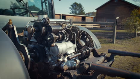 close-up of tractor engine gears on a farm