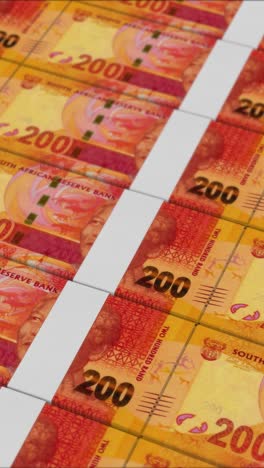 vertical video of 200 south african rand banknotes printed by a money press