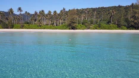 Young-man-in-crystal-clear-turquoise-sea