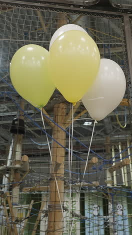 balloons hanging in a play area