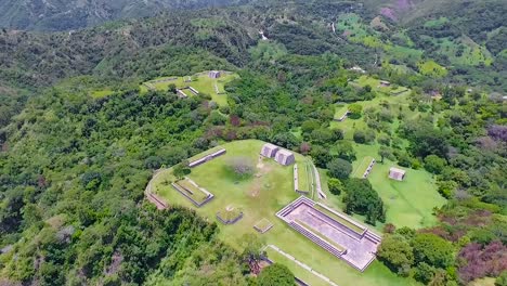 a beautiful sunny day in the green forest on the mountains of tikal ruins.
