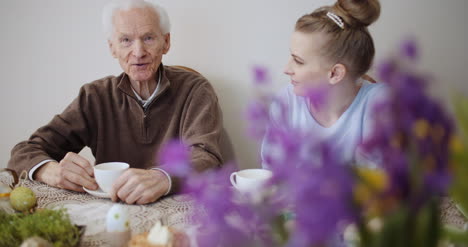 Happy-Easter-Grandfather-Talking-With-Granddaughter