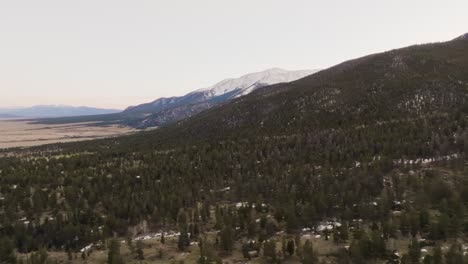 Drone-revealing-Mount-Princeton-in-the-Rocky-Mountains-in-Colorado-with-pine-trees
