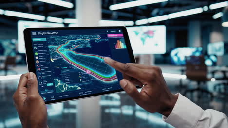 person using a tablet with global map data visualization